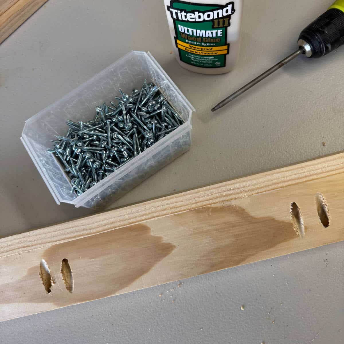 Image of screws, wood glue, and wood with pocket holes.
