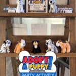 Image of a display of small stuffed puppies with a sign that says Adopt A Puppy.